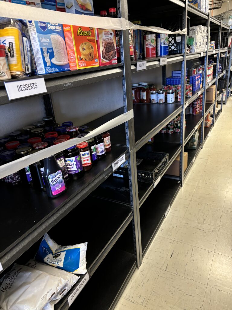 Shelves with canned goods